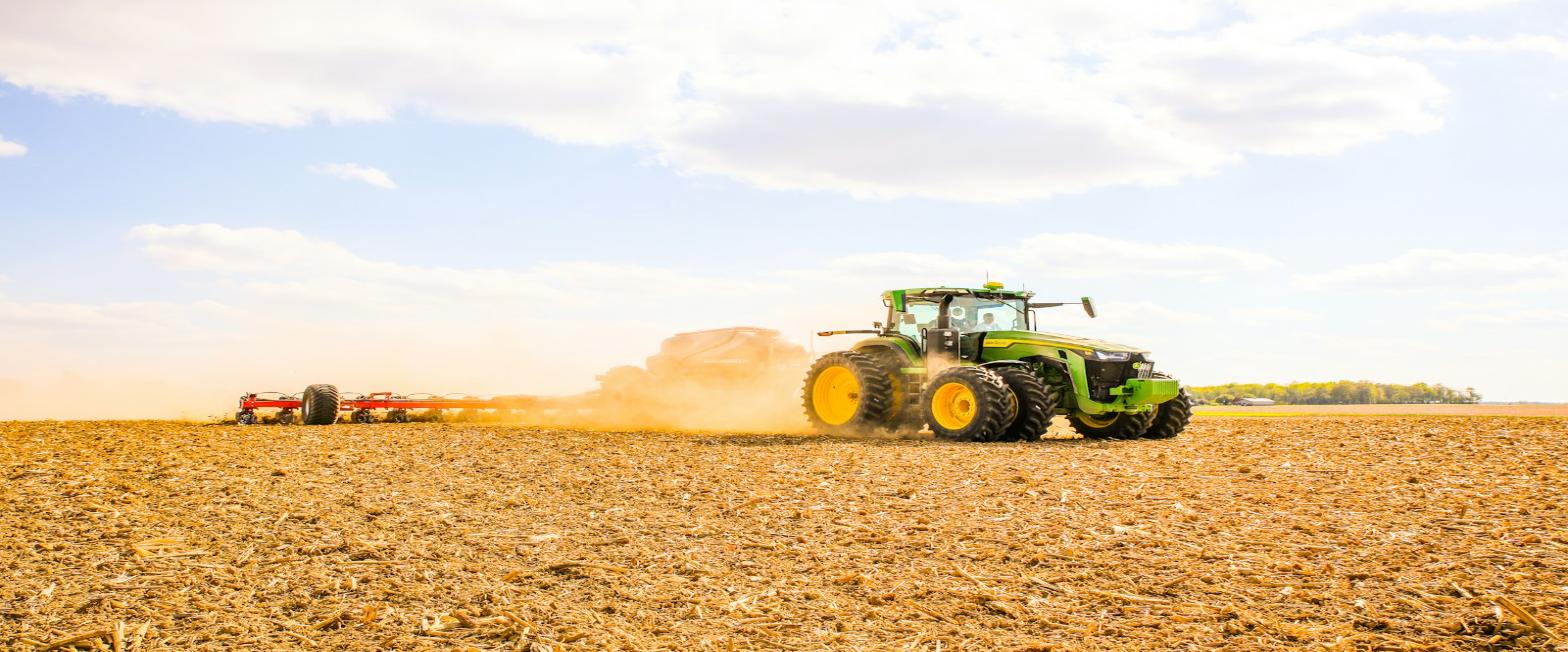 Tractor working farmland in southern Chile